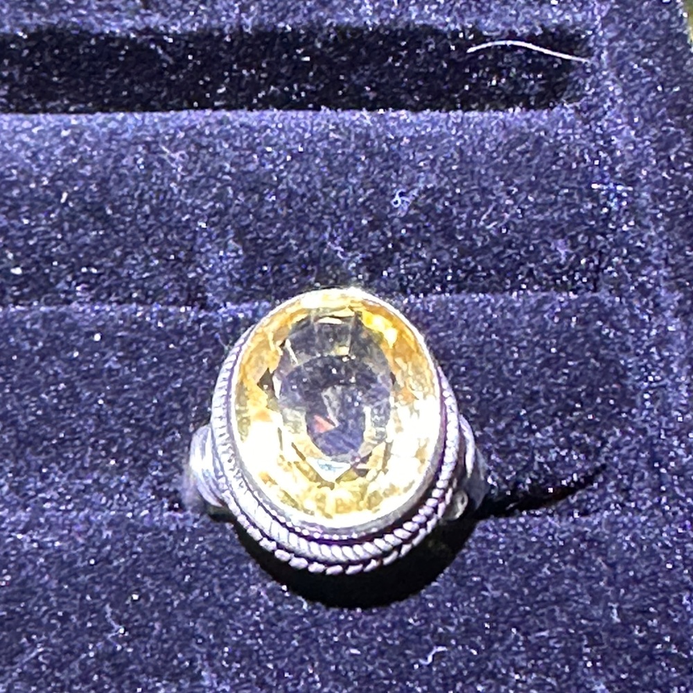 Elegant Silver and Yellow Gemstone Ring